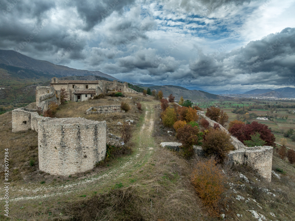 Fototapeta premium Aerial view of Medieval Fortress of Sant'Eusanio Forconese, Abruzzo: A strategic, oval-plan enclosure with five semicircular and four square towers