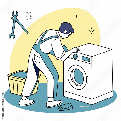 Man repairing a washing machine with tools and basket