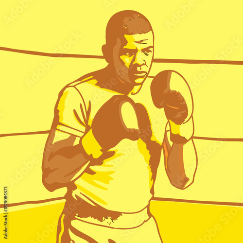 A determined boxer stands in a fighting pose in the ring