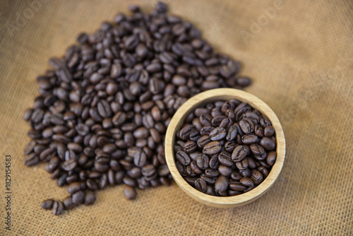 Medium roasted coffee beans in bowl from fresh roast in home cafe