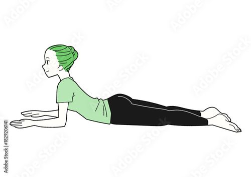 スフィンクスのポーズ　ヨガをする女性　緑のTシャツ