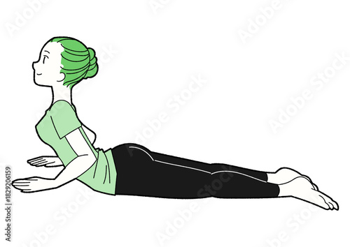 コブラのポーズ　ヨガをする女性　緑のTシャツ