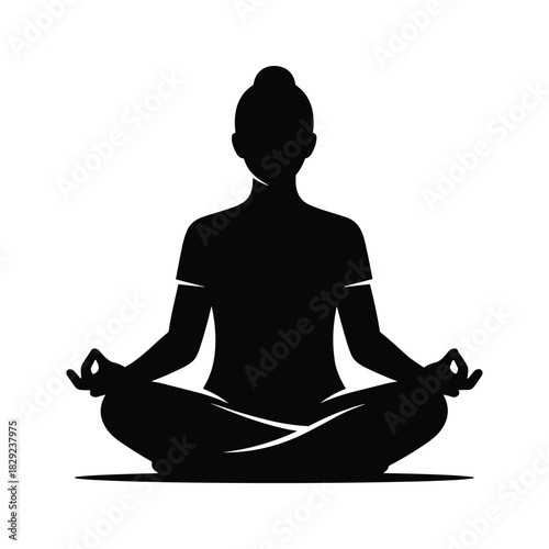 Silhouette of a person meditating in lotus position isolated on
