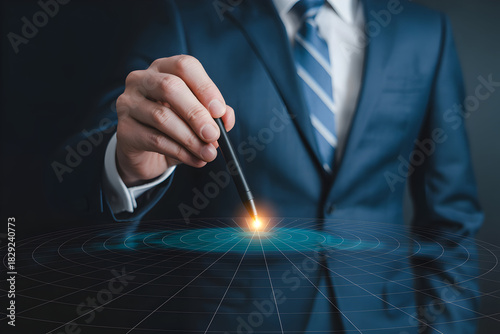 Businessman in a suit interacts with a digital interface using a stylus showcasing technology innovation and modern business solutions for data analysis and strategy