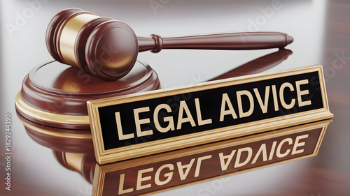 Gavel and legal advice sign on a reflective wooden surface symbolizing law justice and legal consultation services for individuals and businesses seeking guidance