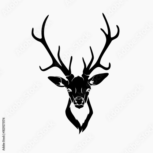 Striking black silhouette of a stag or male deer head facing forward, featuring large, impressive antlers.