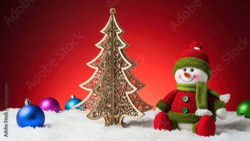 Festive christmas scene with a snowman, golden tree, and colorful baubles