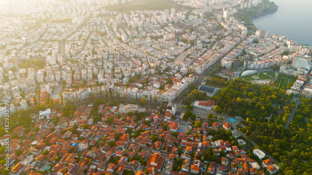 Obraz premium Antalya, Turkey. Aerial drone view showing historic Kaleici district, Kecili Park green space and modern city development in morning light.. Aerial View