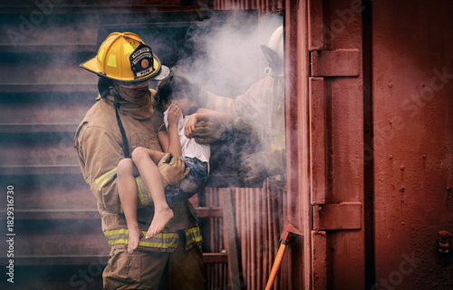 Firefighter rescues child from smoky building during emergency rescue