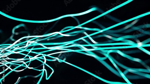 Dynamic Abstract Teal Light Trails Flowing Through Darkness for Tech and Data Visualization