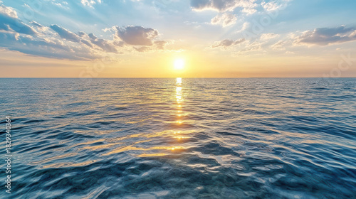Fototapeta Naklejka Na Ścianę i Meble -  Sunset sea horizon calm ocean reflection warm light