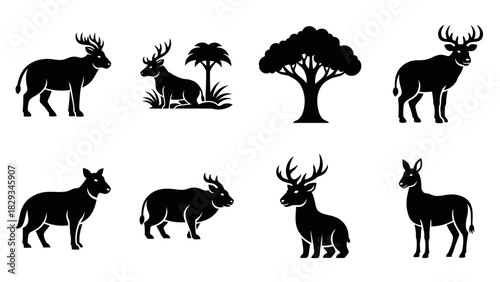 Various silhouettes of deer, trees, and other horned animals showcased on a white background
