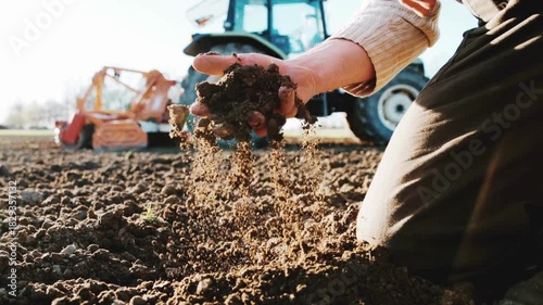 Wallpaper Mural Male hands full of fertile soil, land field agriculture concept. Handful of dirt holding dark soil from organic field. Human hands holding ecologically controlled re-constituted soil. Torontodigital.ca