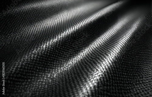 Abstract woven textured surface with dramatic lighting and subtle movement