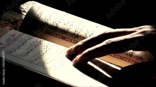 Islam holly book quran in shade shadow decoration muslim calligraphy religion background