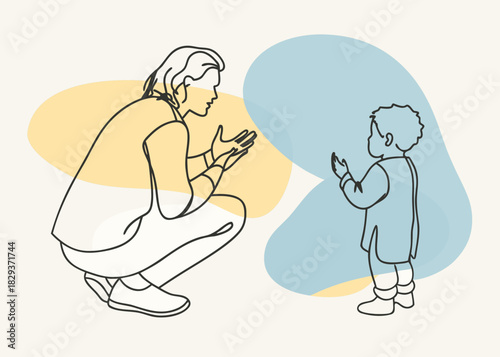 Adult and child in conversation with abstract shapes in the background