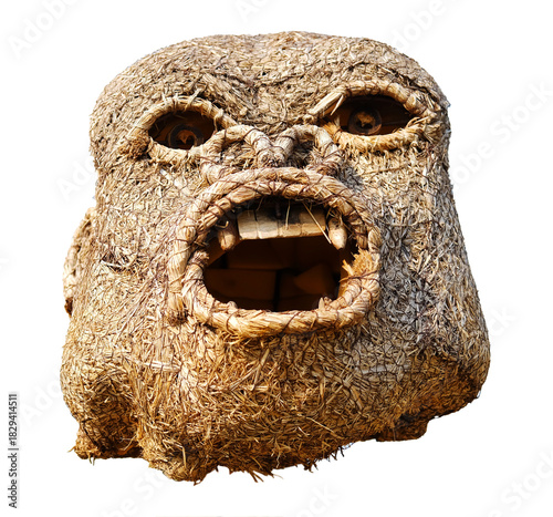 Scary of head of monkey puppet is made from woven straw into the shape of a large gorilla