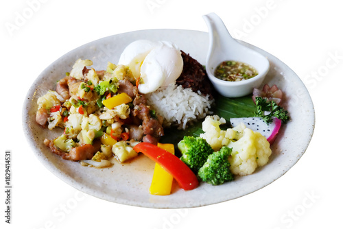 Stir-fried pork with cauliflower with boiled egg, fish sauce, broccoli and raspberry rice on a white plate