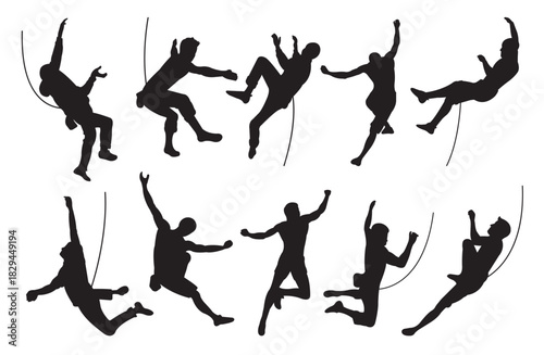 silhouette of wall climbers