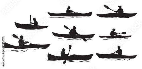 silhouettes of people in kayaks 