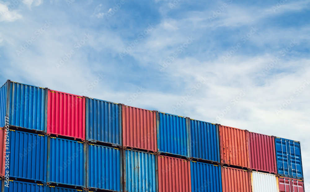 Fototapeta premium Cargo ship container goods export import international transport on blue sky background, warehouse industry business logistics transportation harbor port industrial shipping terminal cargo ship.