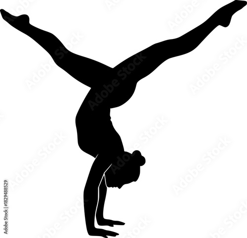  black silhouette of a flexible acrobat performing a handstand