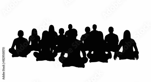 Group of people meditating in a yoga class silhouette.