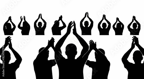 Silhouette of people clapping hands in appreciation and celebration.