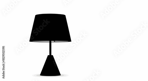 Modern black table lamp with a conical base isolated on a white background.