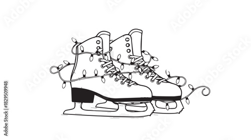 A pair of elegant ice skates with decorative swirls and leaves in a classic black and white silhouette style