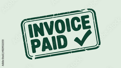 A green rubber stamp with the words invoice paid and a check mark on a light green background image