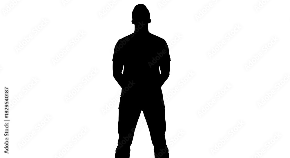 Fototapeta premium Silhouette of a man standing with hands behind his back against a white background in a studio shot