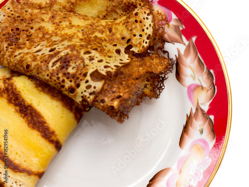 Pancakes lying on a plate.