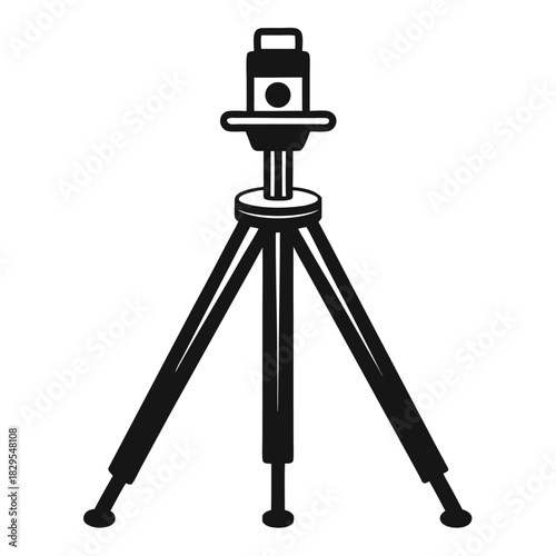 Black tripod stands firmly ready for camera use in a minimalistic design