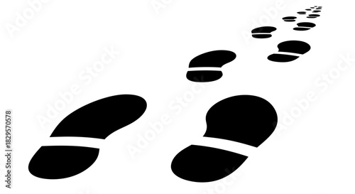 Black footprints fading into the distance on a white background.