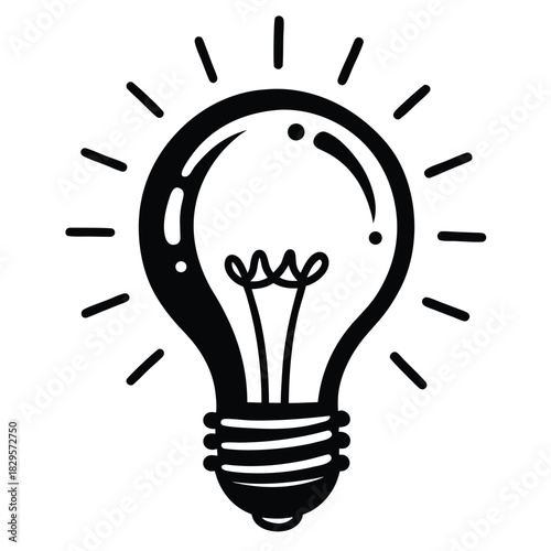 Black and white showcases an illuminated light bulb generating bright rays