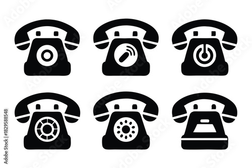 Black landline phones with various button designs are aligned on a white background