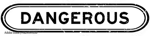 Grunge black dangerous word rubber seal stamp on white background