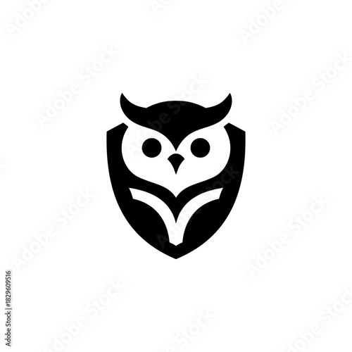 A sleek black owl silhouette logo featuring bold shapes, sharp curves, and symmetrical design elements