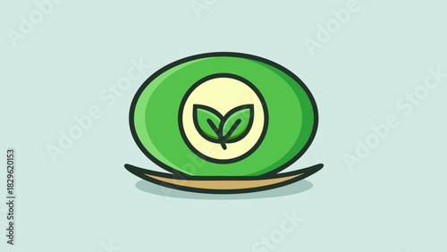 A green vegan plate with a leaf based logo