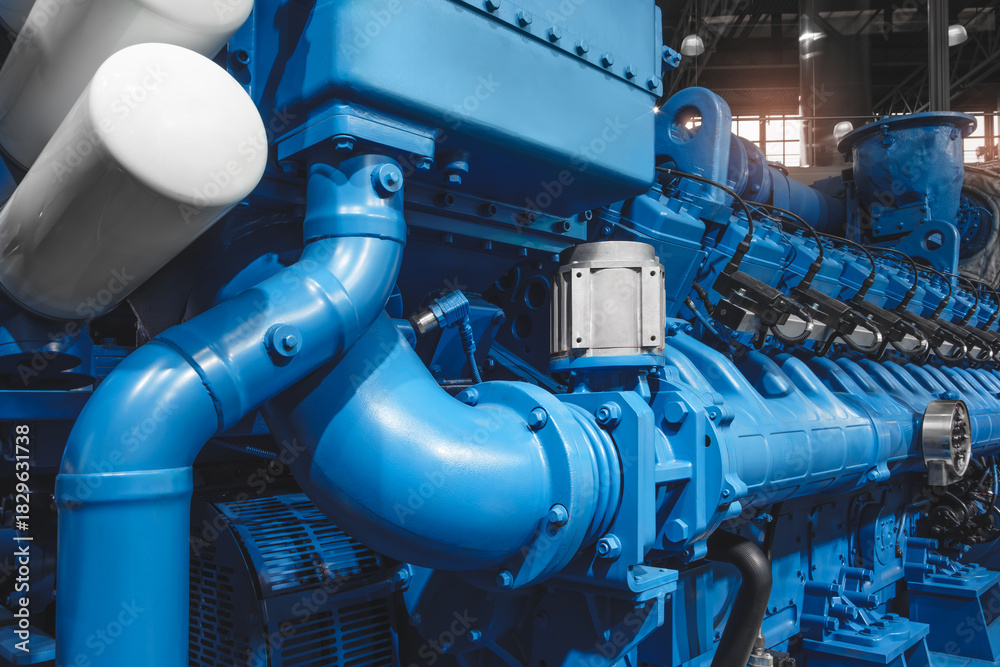 Obraz premium Industrial large gas diesel electric generator bottom up view, industrial background.