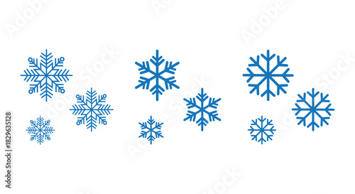 Collection of stylized blue snowflakes in various sizes and designs on a clean white background, ideal for winter icons, Christmas decorations, web graphics, packaging, patterns and seasonal design pr