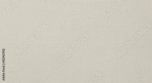 Light beige fabric texture showing a tight woven pattern. The clean surface has a soft natural appearance. Perfect for backgrounds, design projects, or crafting materials.