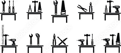 Black and white silhouettes of tools on tables for construction and repair