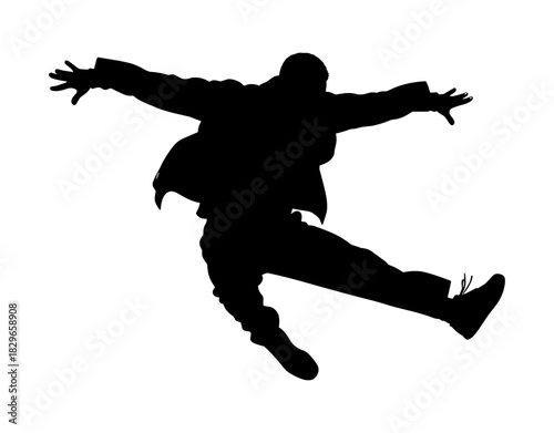 Silhouette of a man falling or diving through the air
