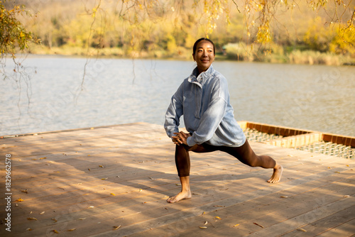 Korean woman practicing yog...