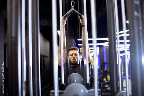 Man working out in a gym du...