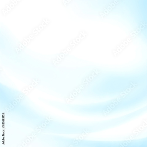 A vibrant blue sky adorned with fluffy white clouds, illuminated by soft, radiant sunlight, creating a serene and uplifting atmosphere.