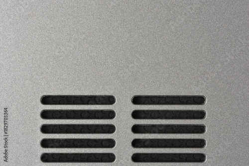 Cuadro en lienzo A horizontal close-up shot of a textured, silver-gray metallic surface featuring