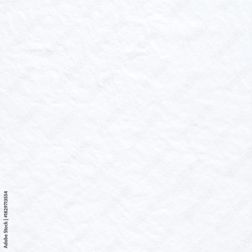 Fototapeta premium A textured white wall partially covered in soft, fluffy snow, with delicate snowflakes glistening in the sunlight, creating a serene winter scene.